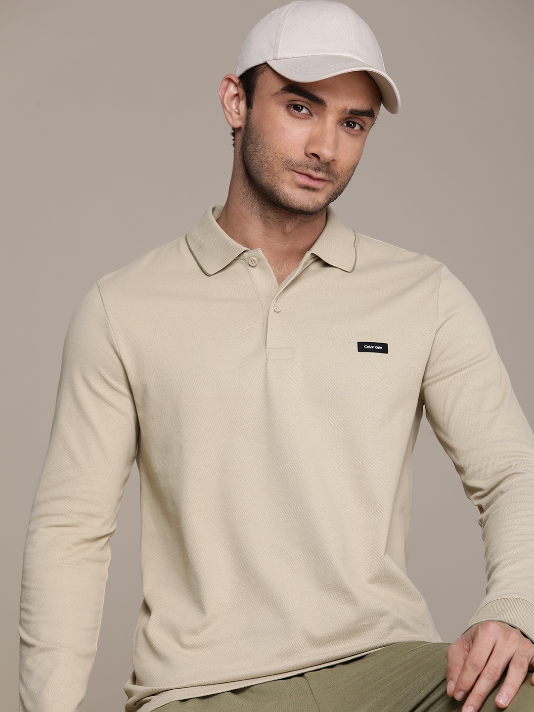 

Calvin Klein Jeans Solid Polo Collar Slim Fit T-shirt, Beige