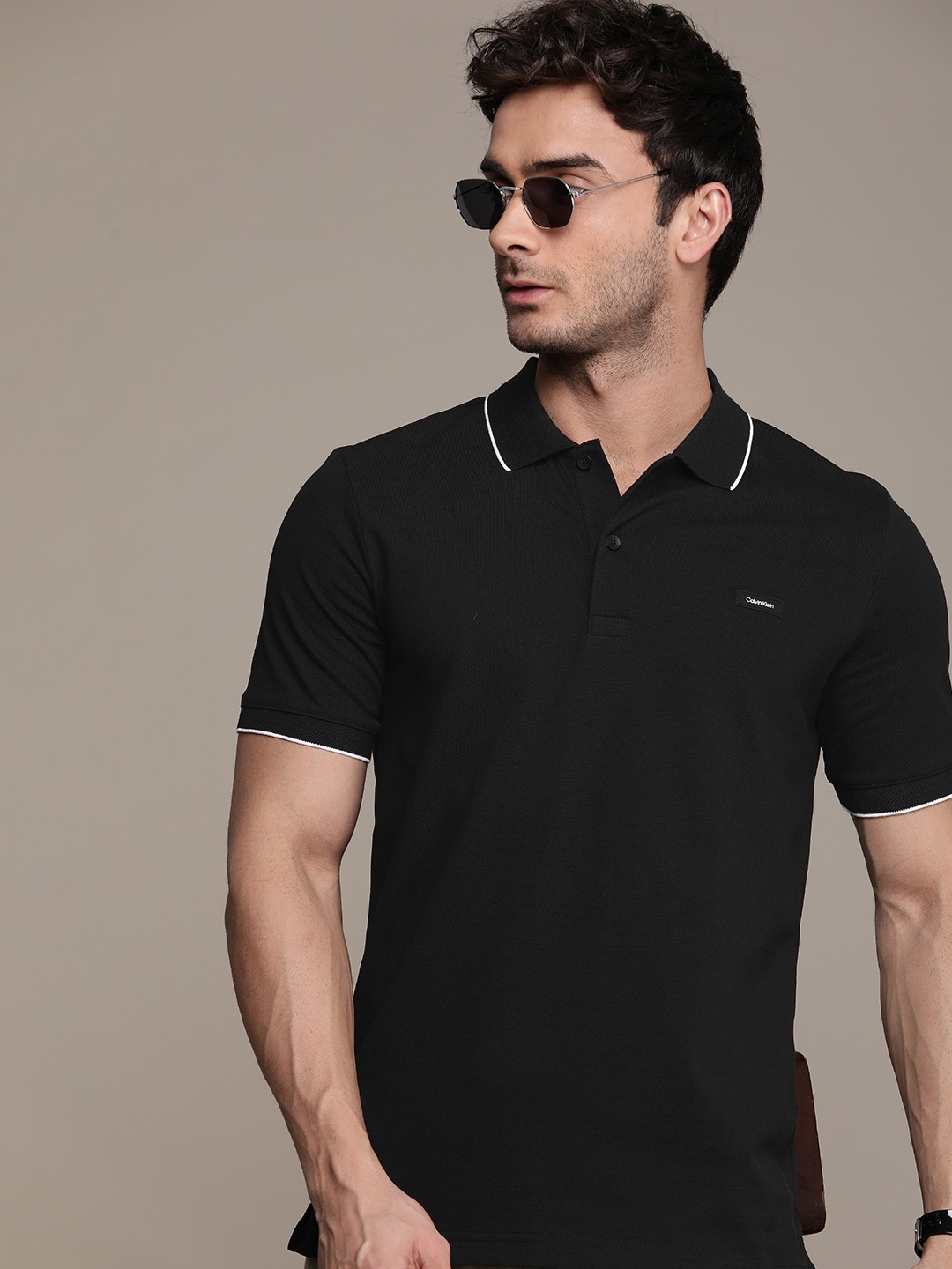 

Calvin Klein Jeans Solid Polo Collar Slim Fit T-shirt, Black