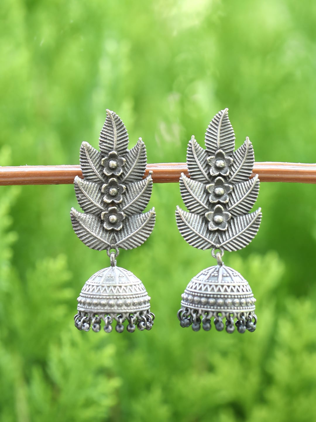 

Sangria Silver-Plated Oxidised Jhumkas