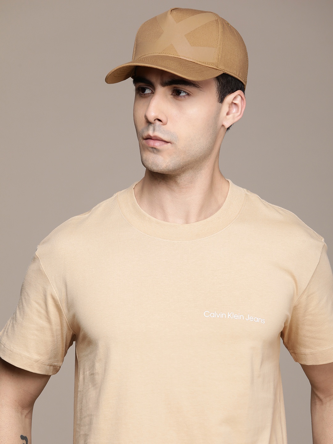 

Calvin Klein Jeans Men Pure Cotton T-shirt, Beige