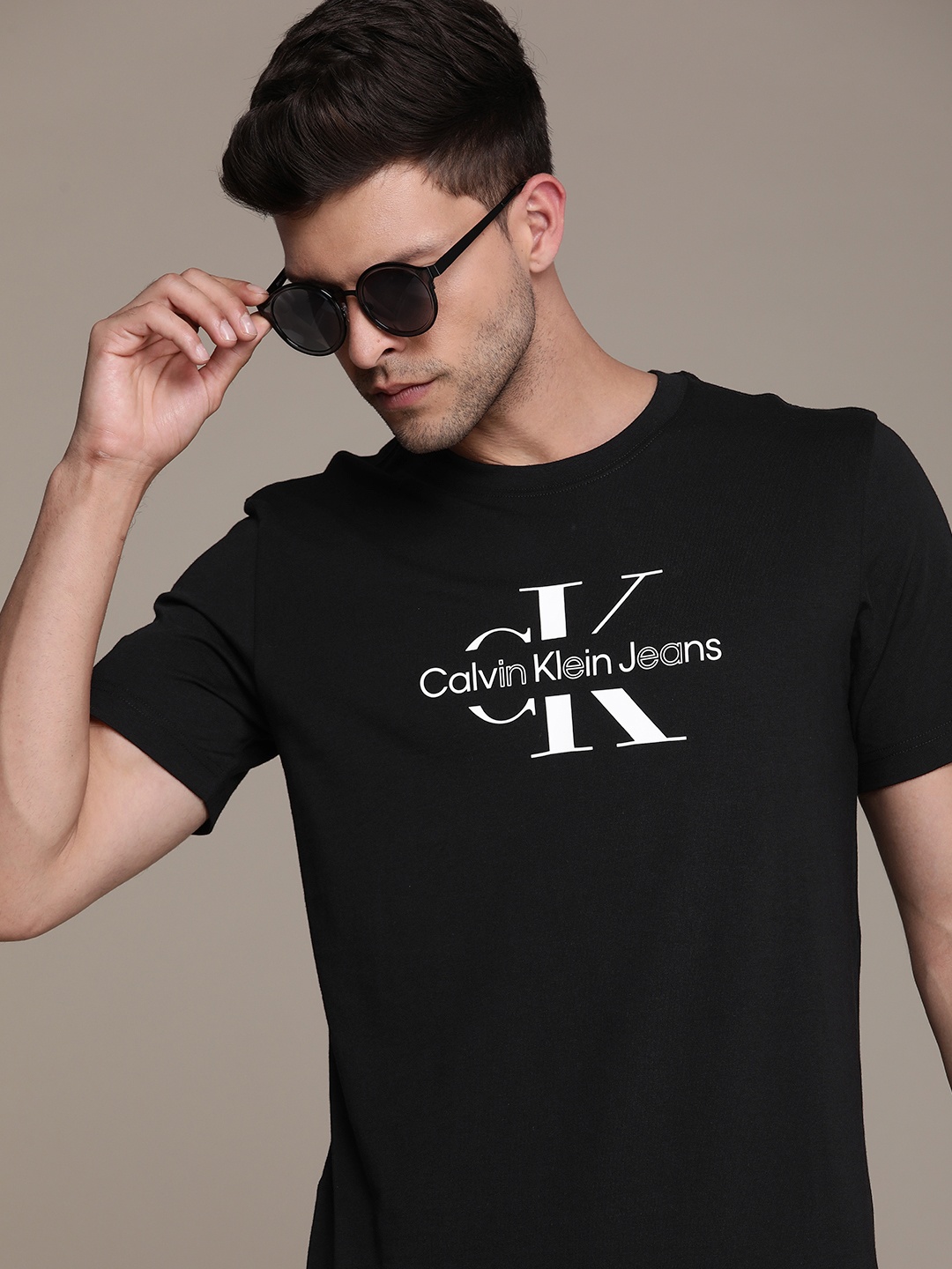 

Calvin Klein Jeans Brand Logo Printed Pure Cotton T-shirt, Black