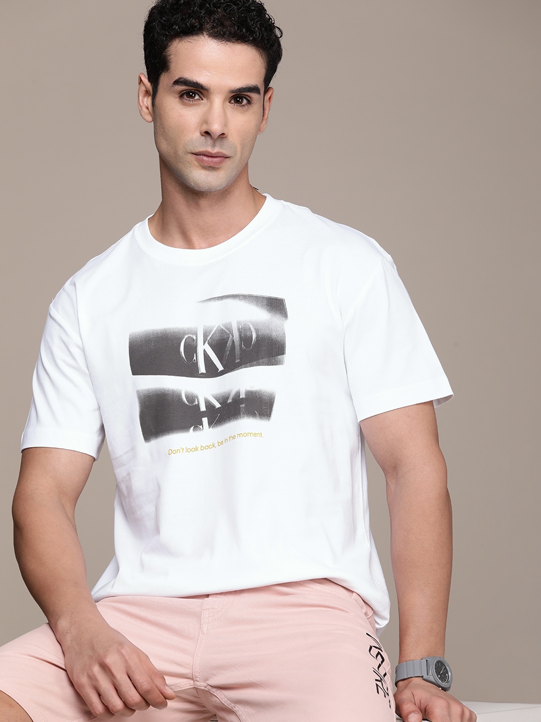 

Calvin Klein Jeans Brand Logo Printed Drop-Shoulder Sleeves Pure Cotton T-shirt, White