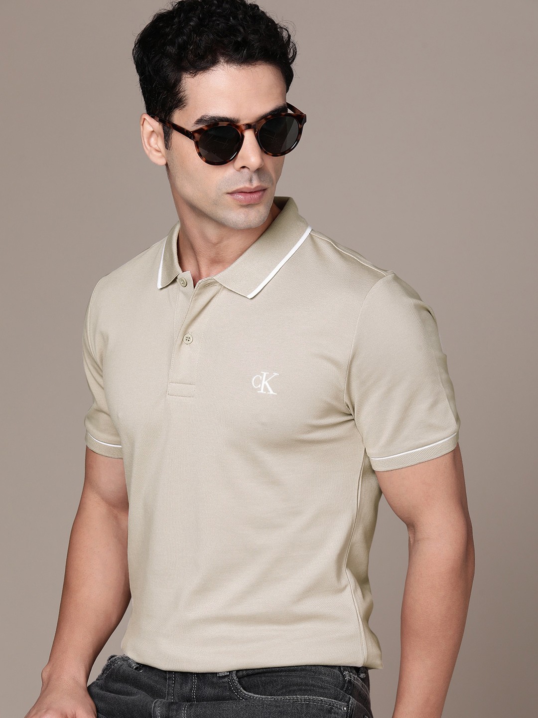 

Calvin Klein Jeans Solid Polo Collar Slim Fit T-shirt, Beige