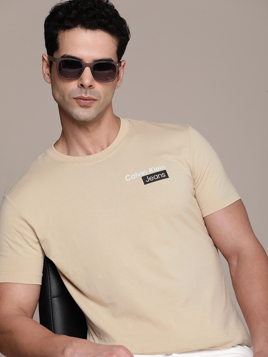 

Calvin Klein Jeans Men Pure Cotton Slim Fit T-shirt, Beige