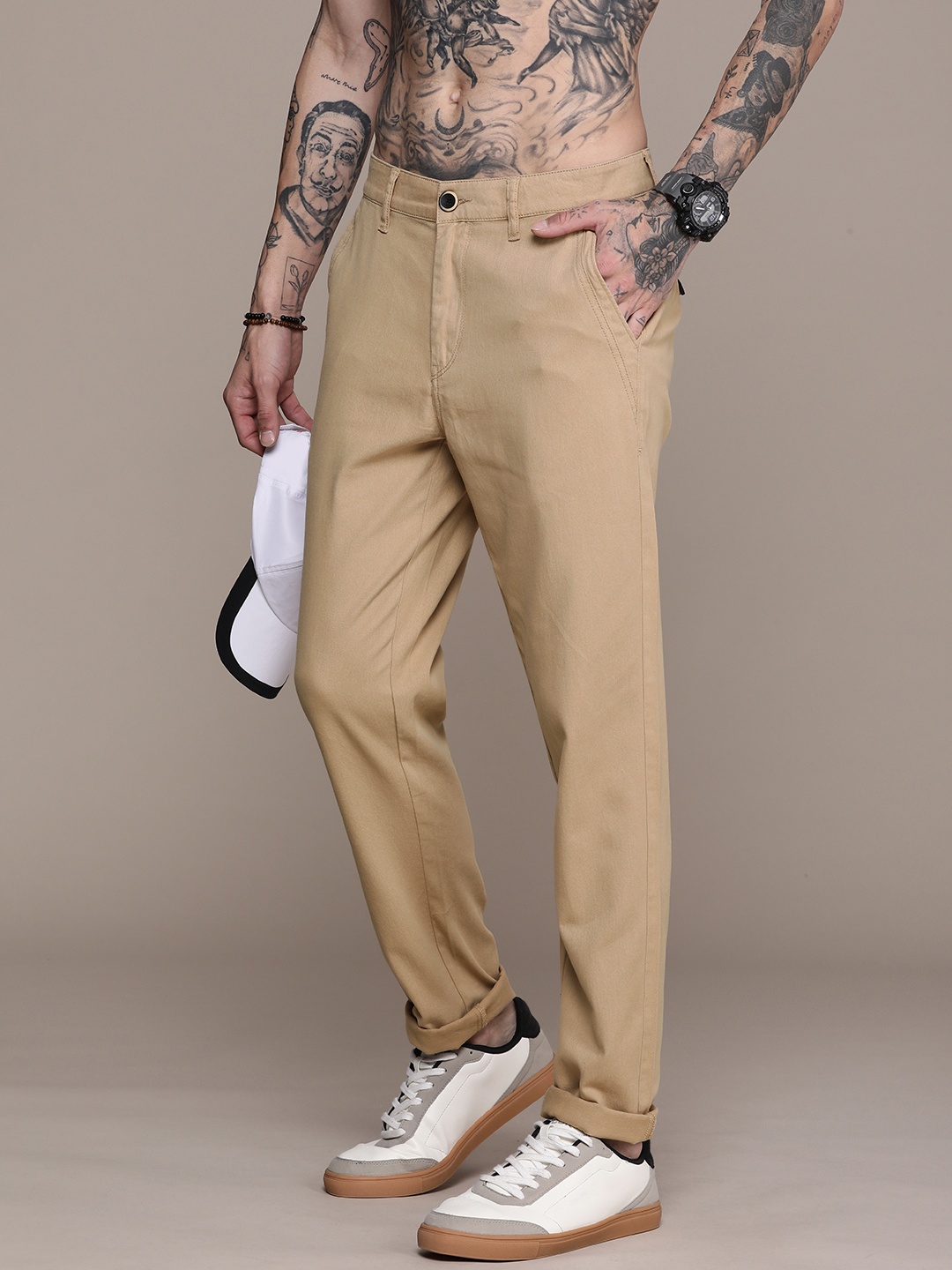 

The Roadster Life Co. Men Solid Pure Cotton Chino Trousers, Beige