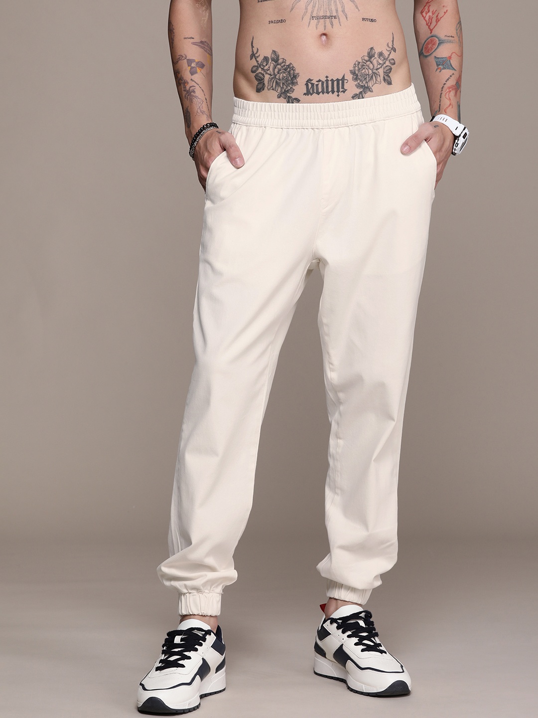 

The Roadster Life Co. Men Pure Cotton Solid Mid Rise Joggers Trousers, Off white
