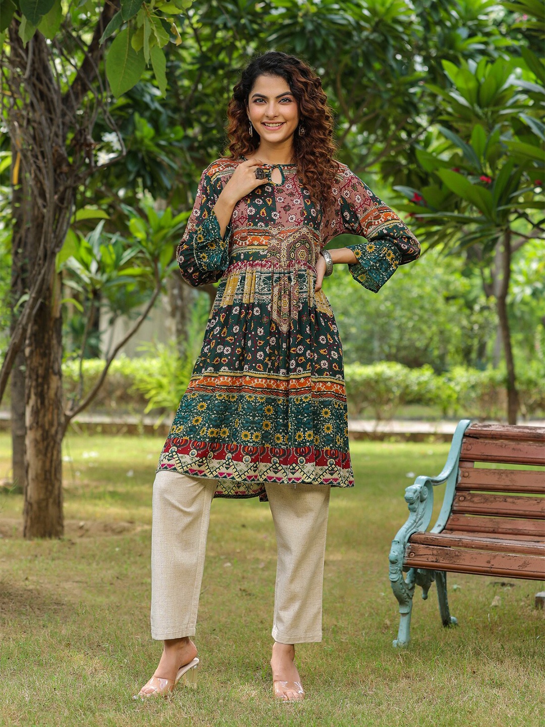 

Rain & Rainbow Ethnic Motifs Printed Bell Sleeves Kurta, Green