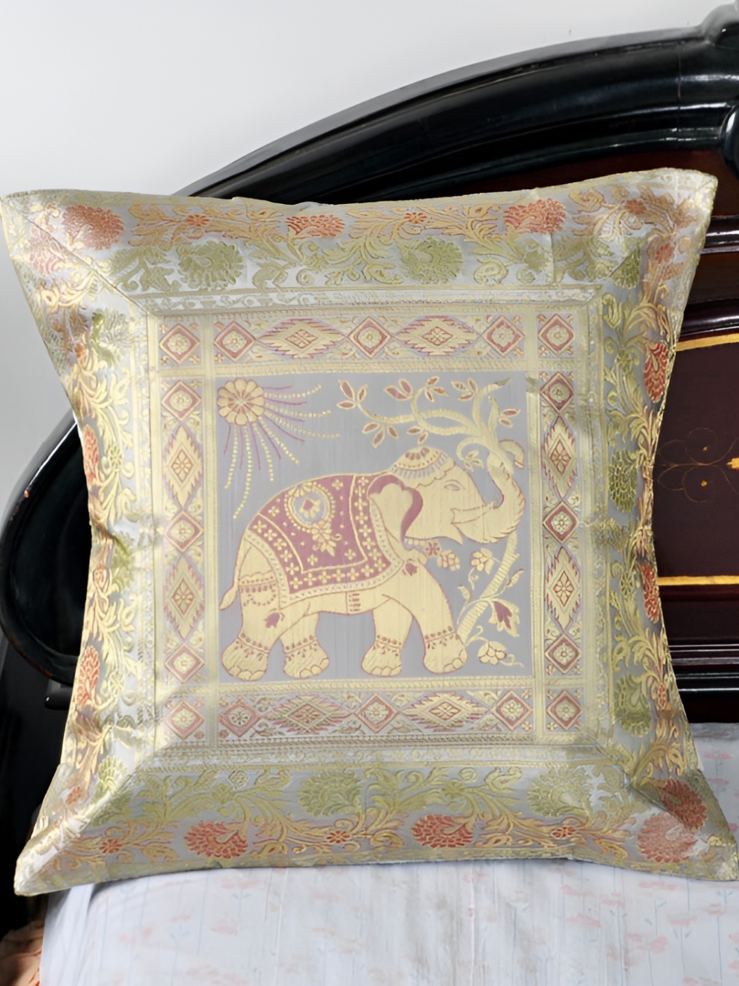 

Lal Haveli Grey & Gold Toned Ethnic Motif Silk Square Cushion Cover