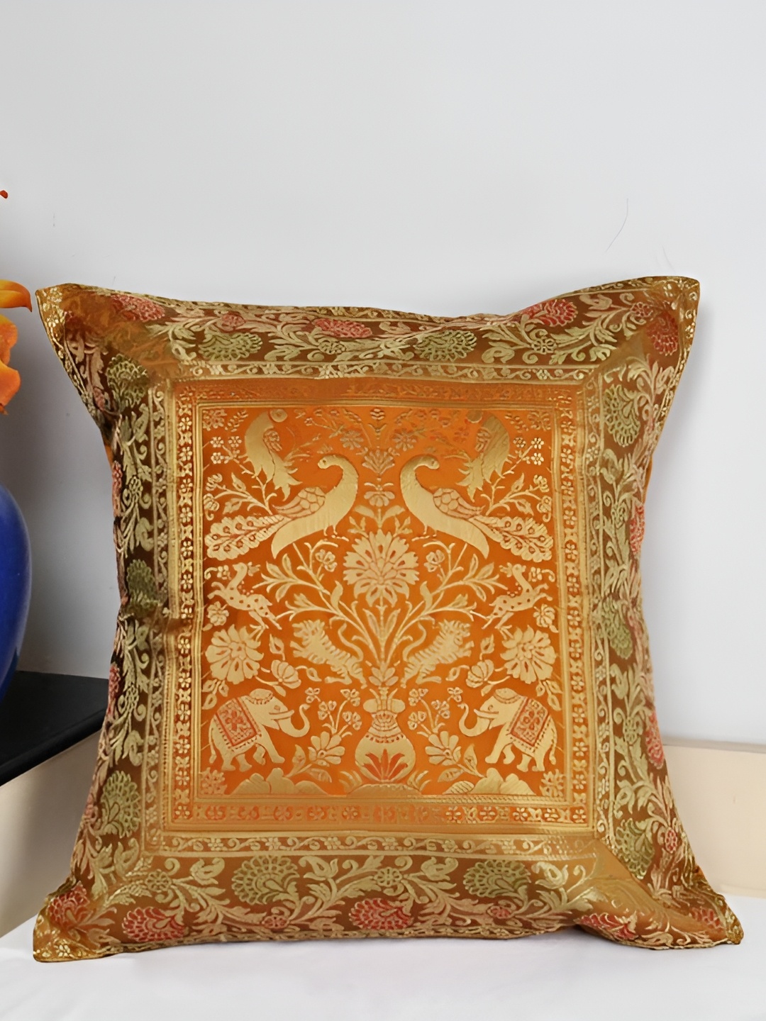 

Lal Haveli Orange & Gold Toned Ethnic Motif Silk Square Cushion Cover