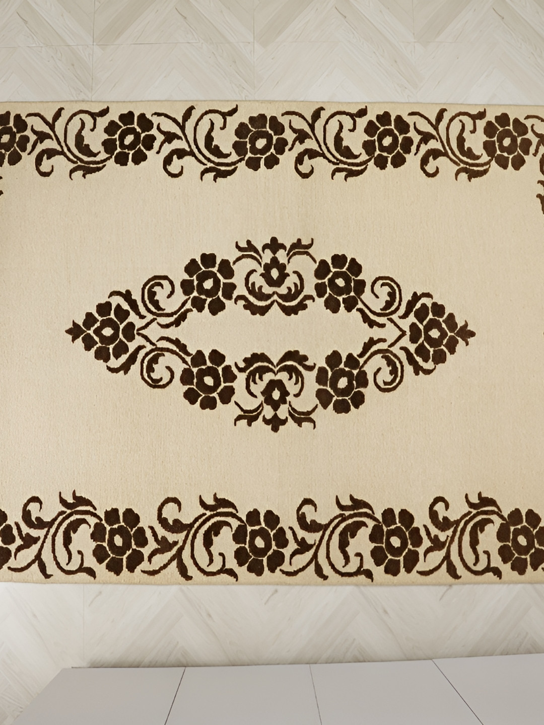 

MIRZAPUR KALEEN AND RUGS Cream & Black Handmade Woollen Carpet