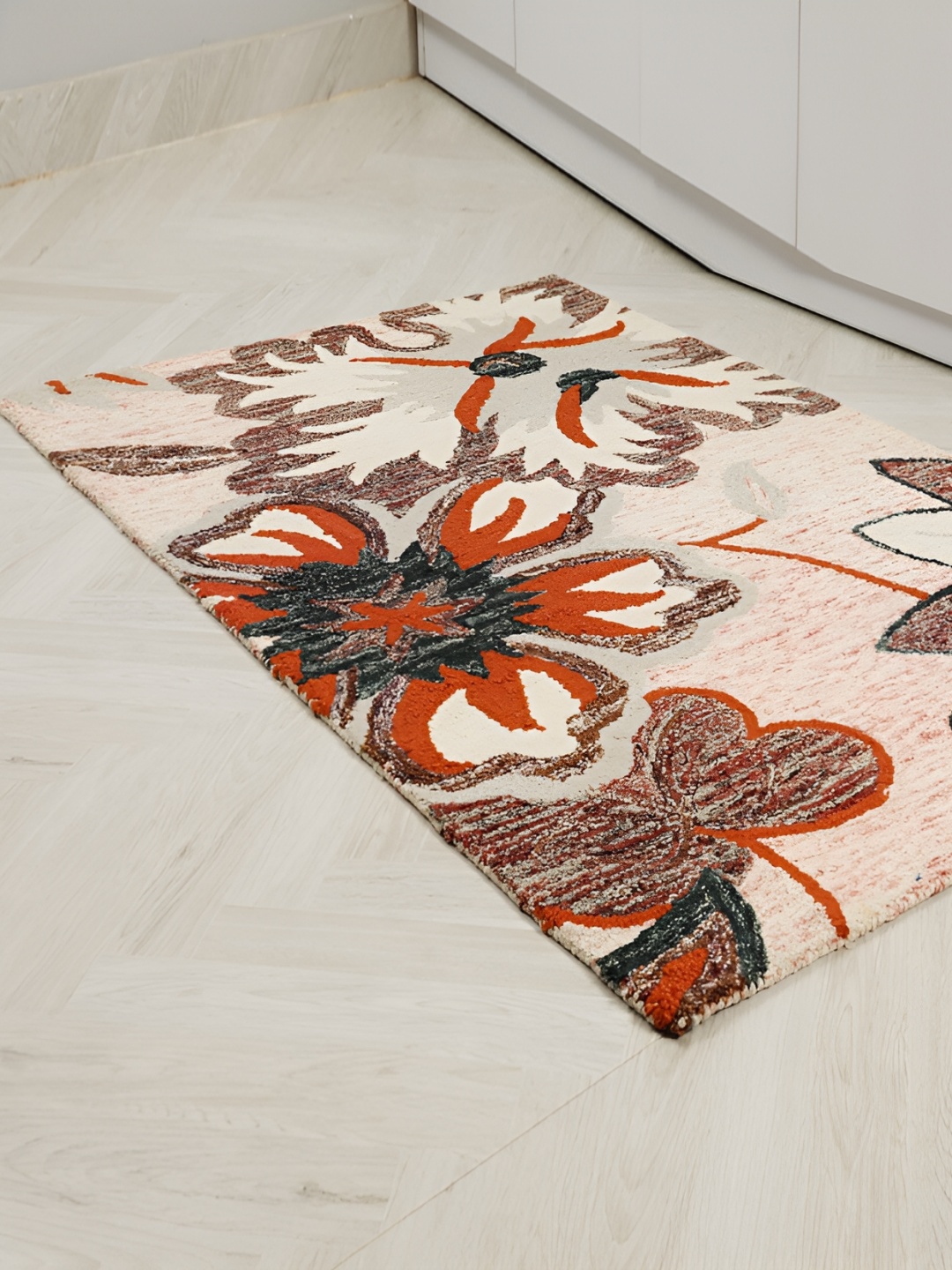 

MIRZAPUR KALEEN AND RUGS Beige & Red Handmade Woollen Carpet