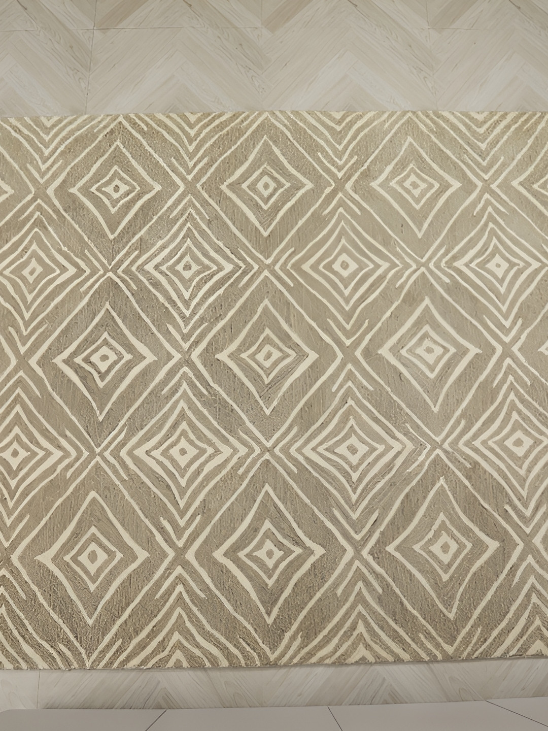 

MIRZAPUR KALEEN AND RUGS Beige & White Handmade Woollen Carpet