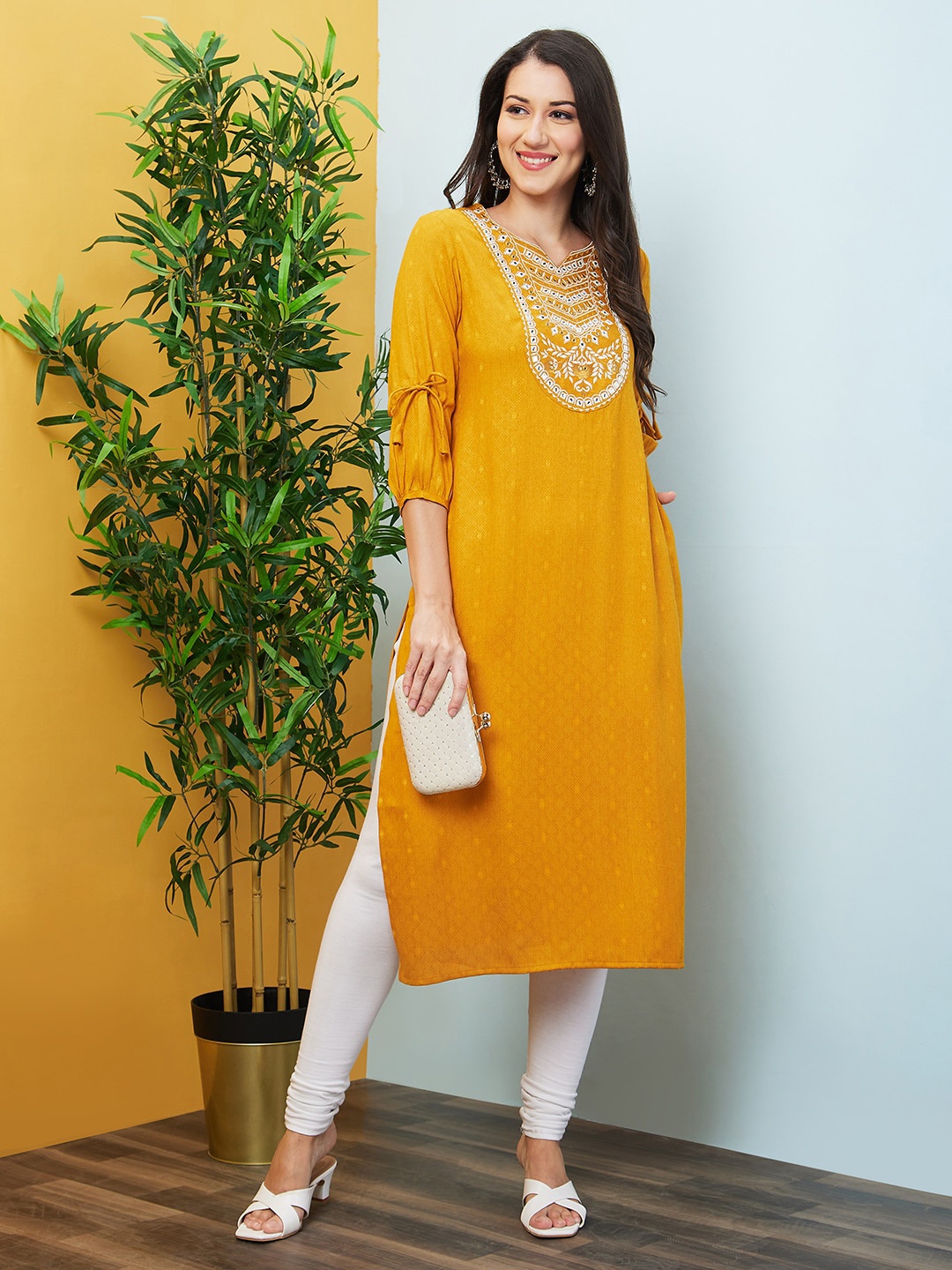 

Globus Ethnic Motifs Woven Design Puff Sleeves Thread Work Dobby Weave Straight Kurta, Yellow