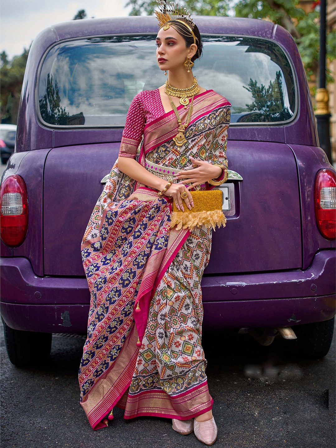 

Mitera Ethnic Motifs Printed Zari Patola Saree, White