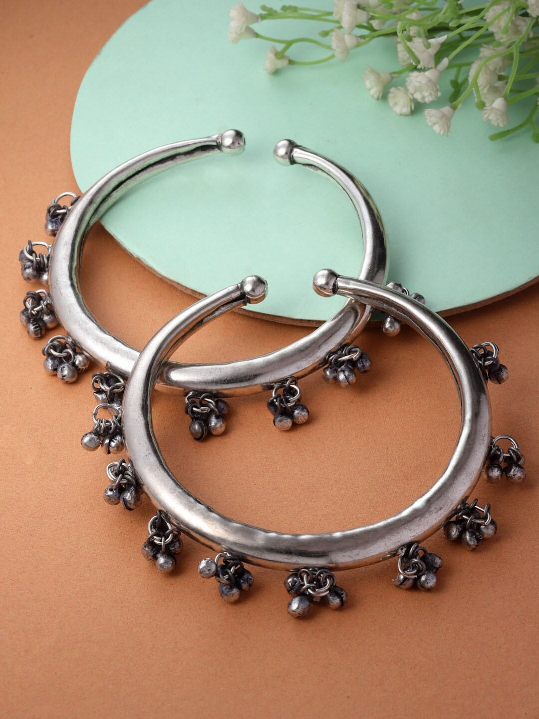 

Sanjog Set Of 2 Oxidised German Silver Plated Tribal Adjustable Ghungroo Kada Anklet