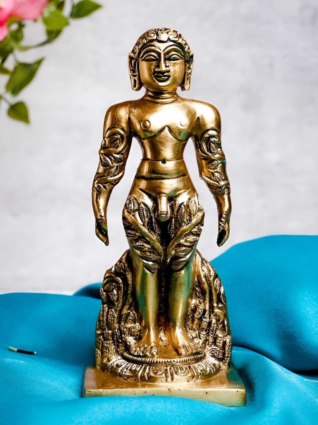 

The Advitya Gold Toned Mahavir- Jain Guru Statue Brass Showpiece