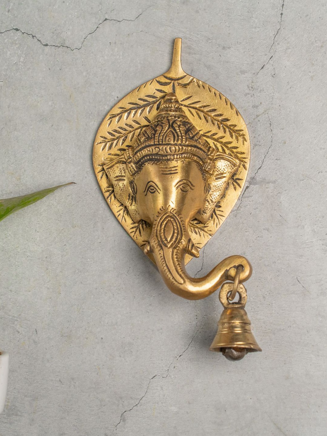 The Advitya Lord Ganesha Face On Leaf With Bells Lord Ganesha Face On Leaf With Bells, Gold