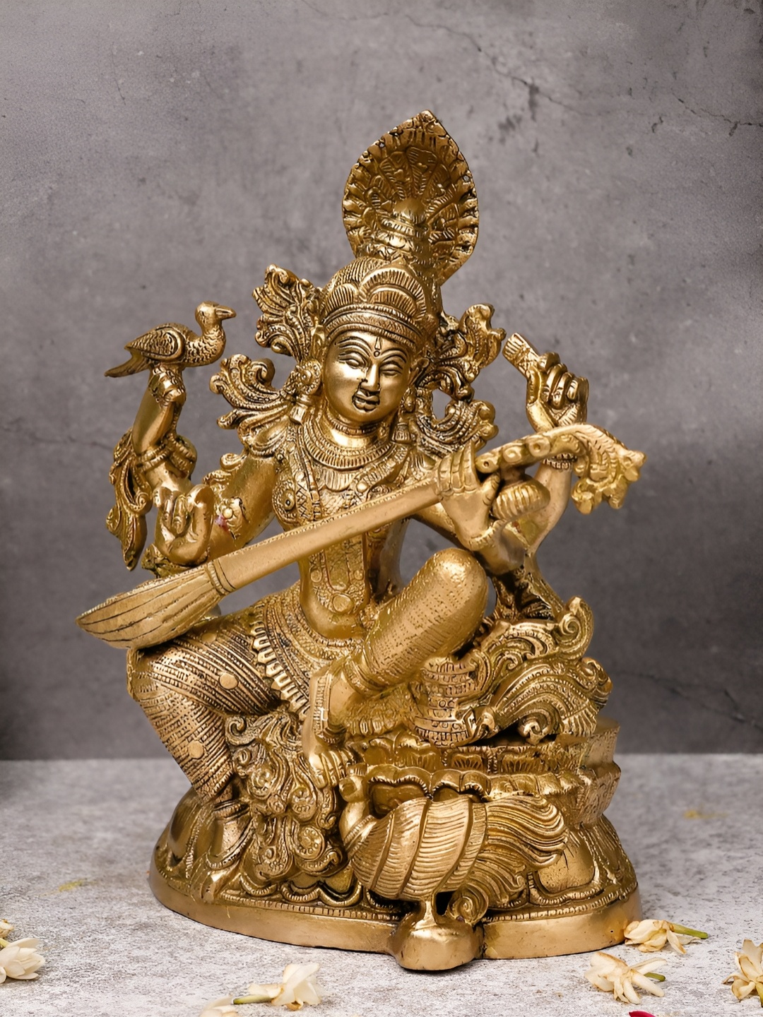 

The Advitya Gold Toned Superfine Chaturbhujadharini Devi Saraswati Showpiece