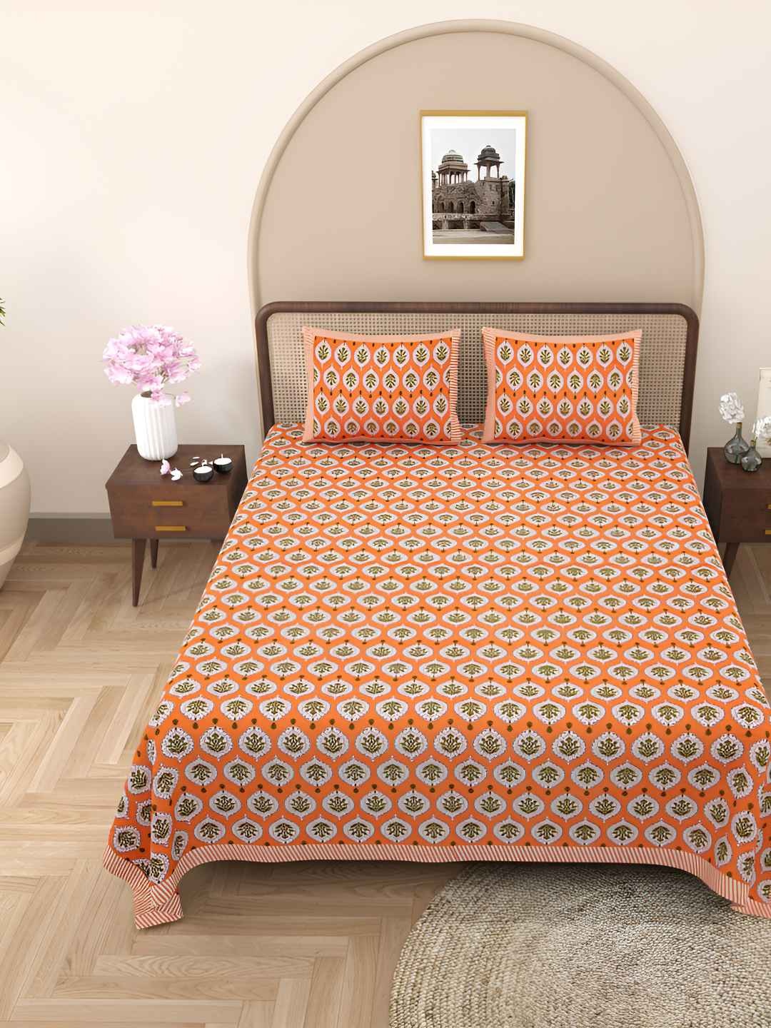 

Jinaya's White & Orange Floral Cotton 300 TC Queen Bedsheet with 2 Pillow Covers