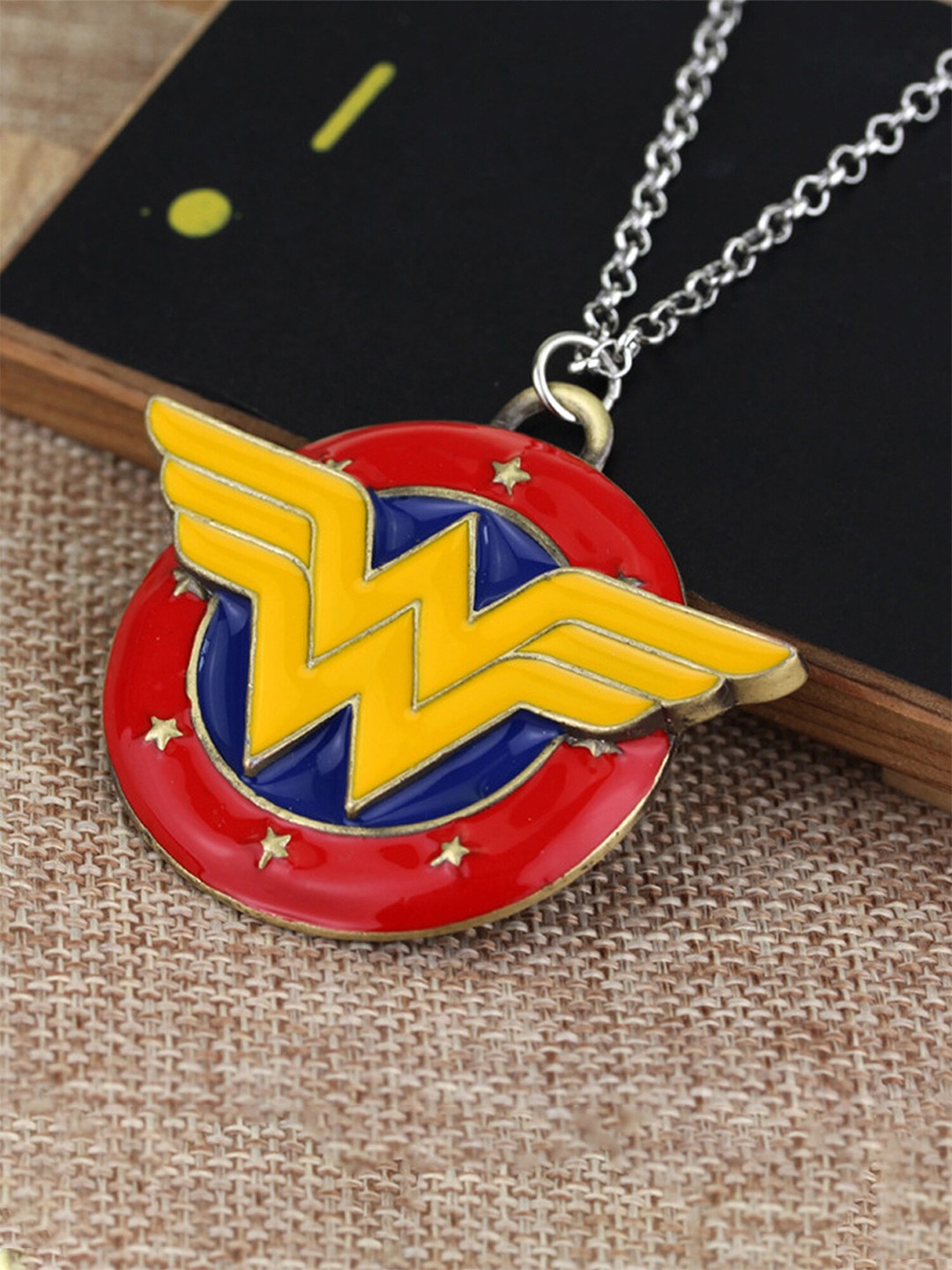 

Yellow Chimes Wonder Woman Symbol Locket Chain Necklace, Silver