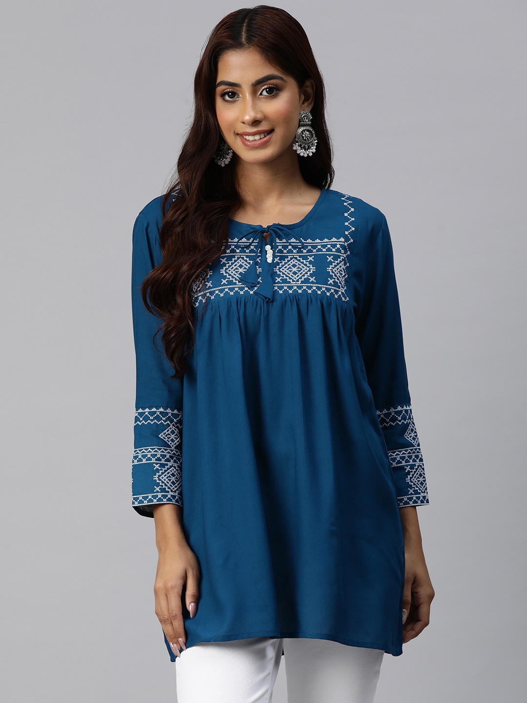 

Readiprint Fashions Geometric Embroidered Thread Work Pleated Kurti, Blue