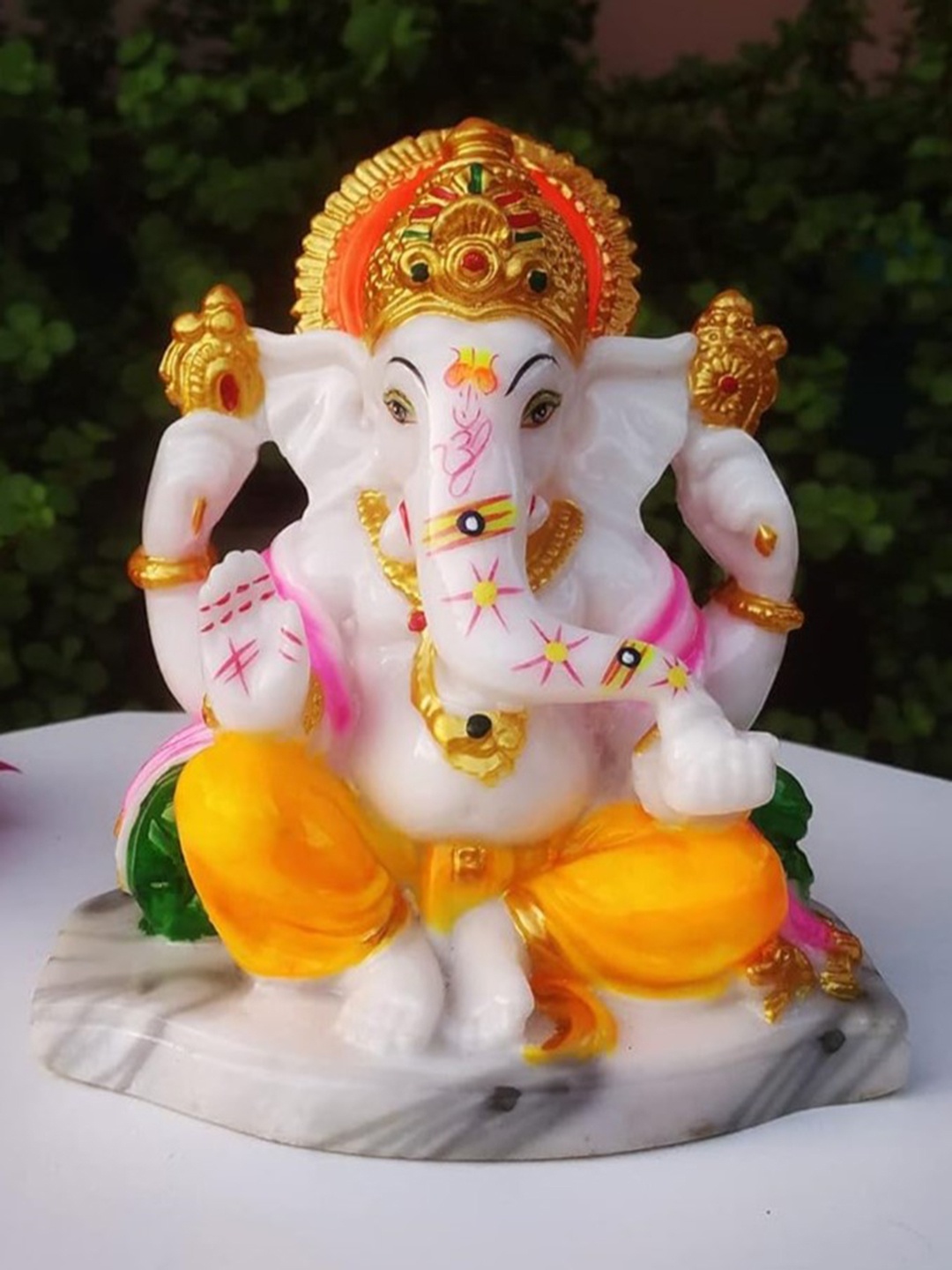

Frizka White & Yellow Ganpati Idol Showpiece