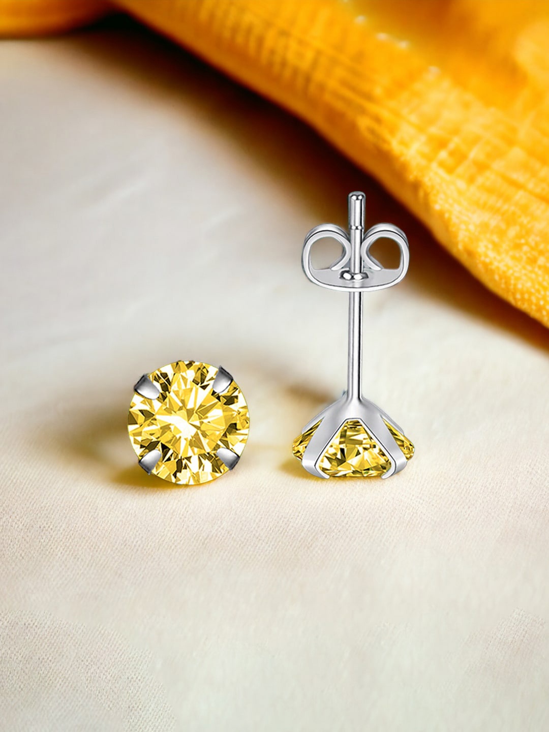 

Designs & You Silver-Plated Cubic Zirconia Contemporary Studs Earrings