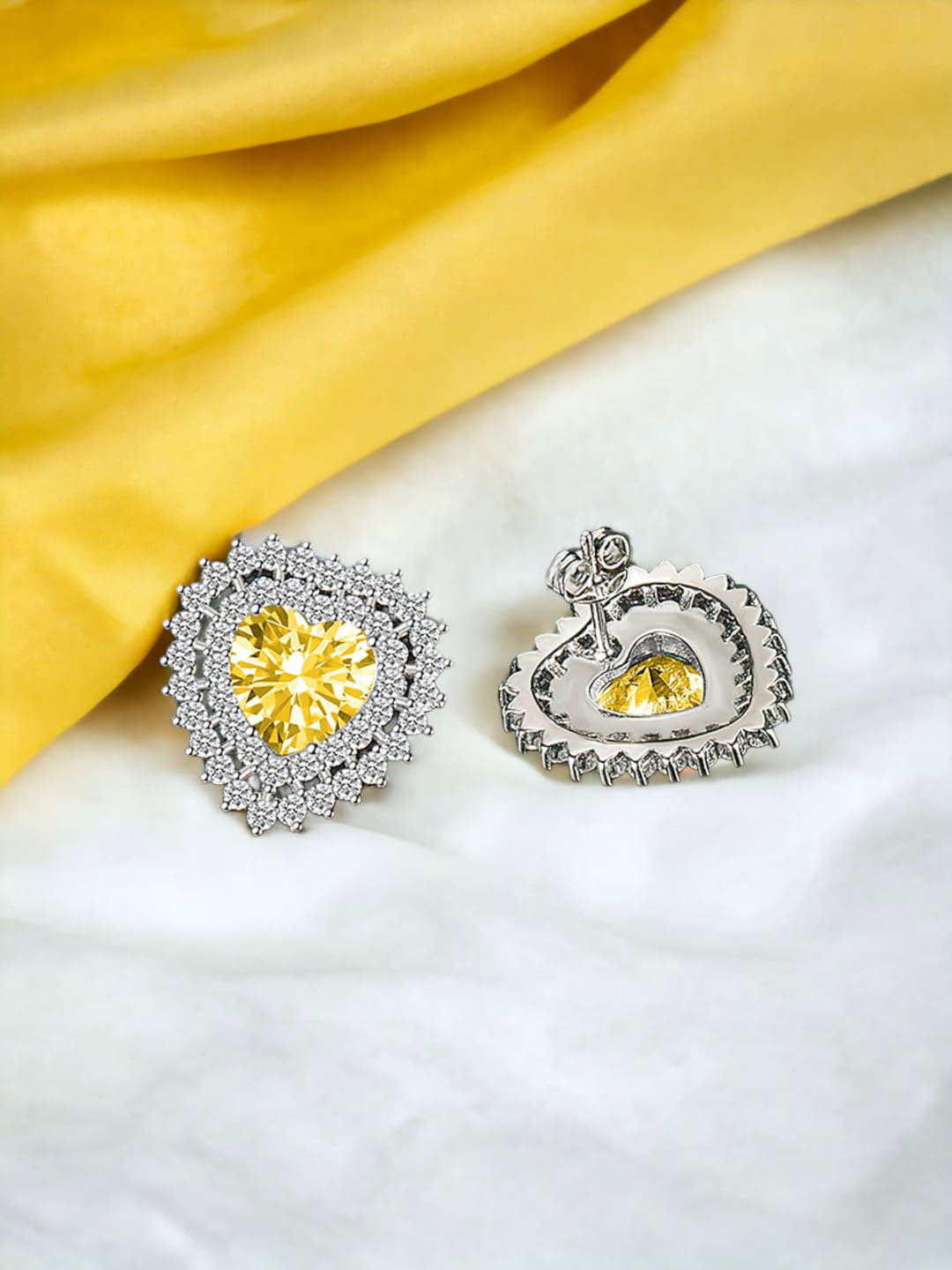 

Designs & You Silver-Plated Heart Shaped Studs Earrings, Yellow