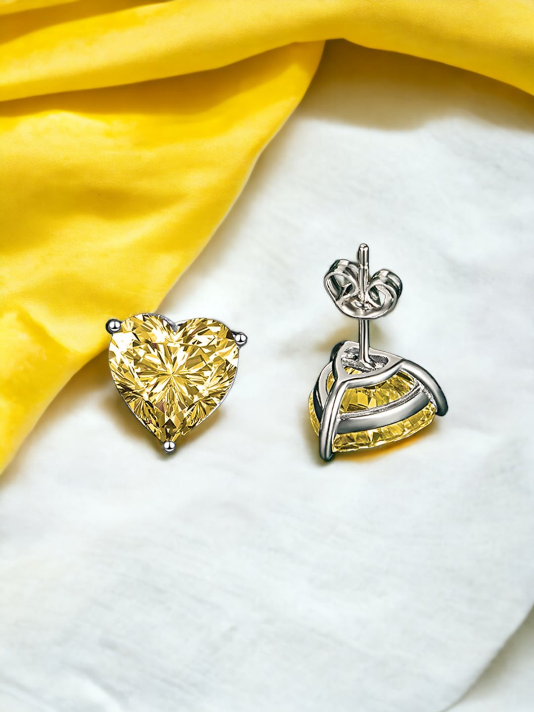 

Designs & You Silver Plated Cubic Zirconia Studded Heart Shaped Studs Earrings