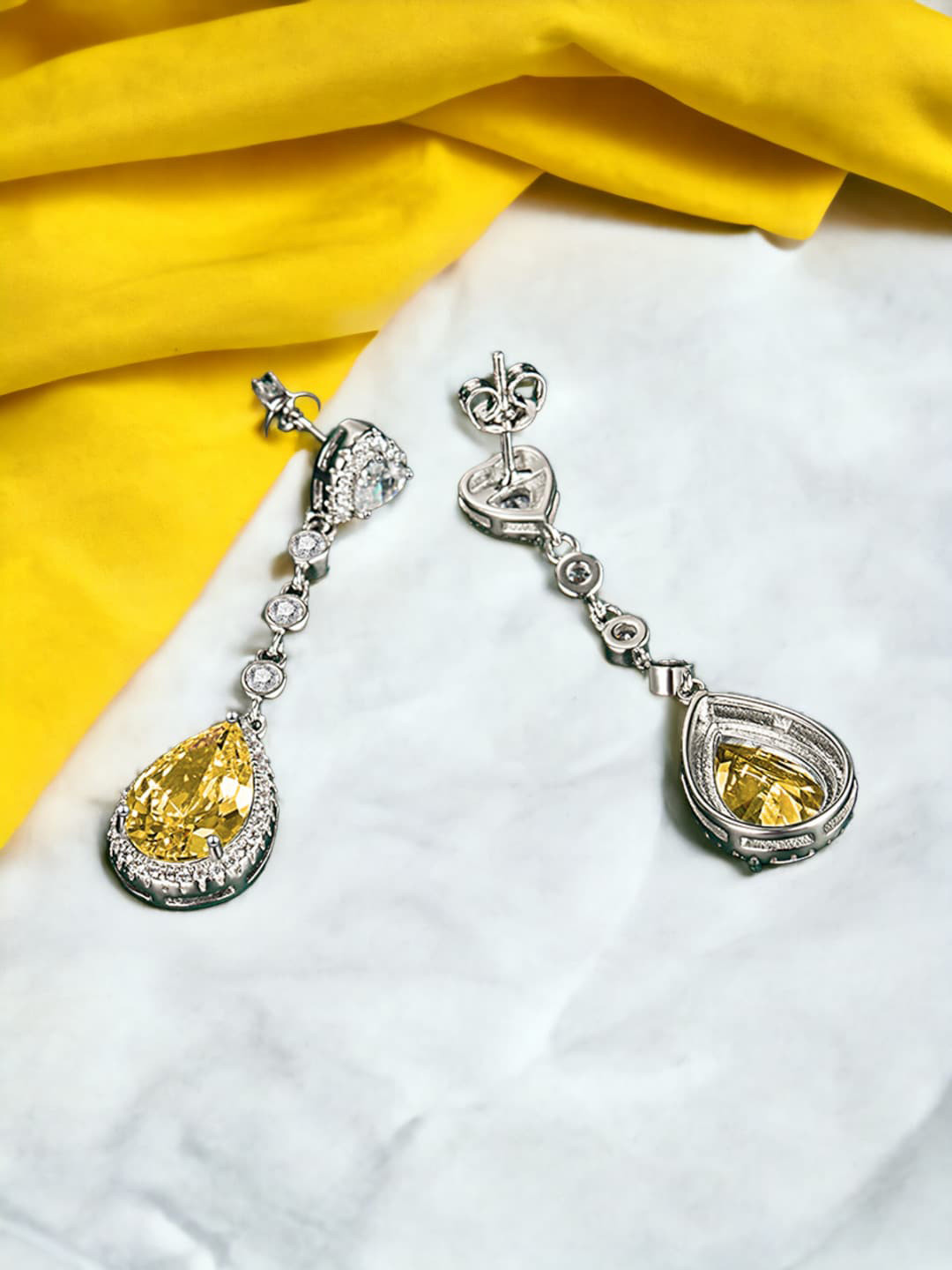 

Designs & You Silver Plated CZ Studded Teardrop Shaped Drop Earrings