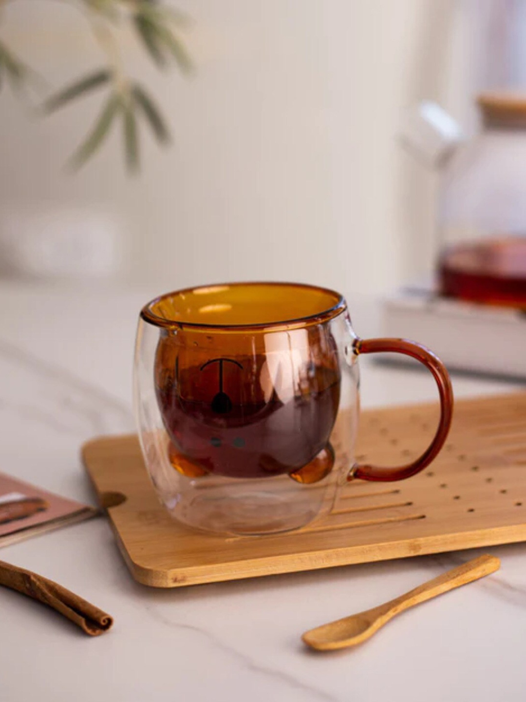 

THEDECORKART Transparent & Brown Printed Glass Glossy Cup 300 ml