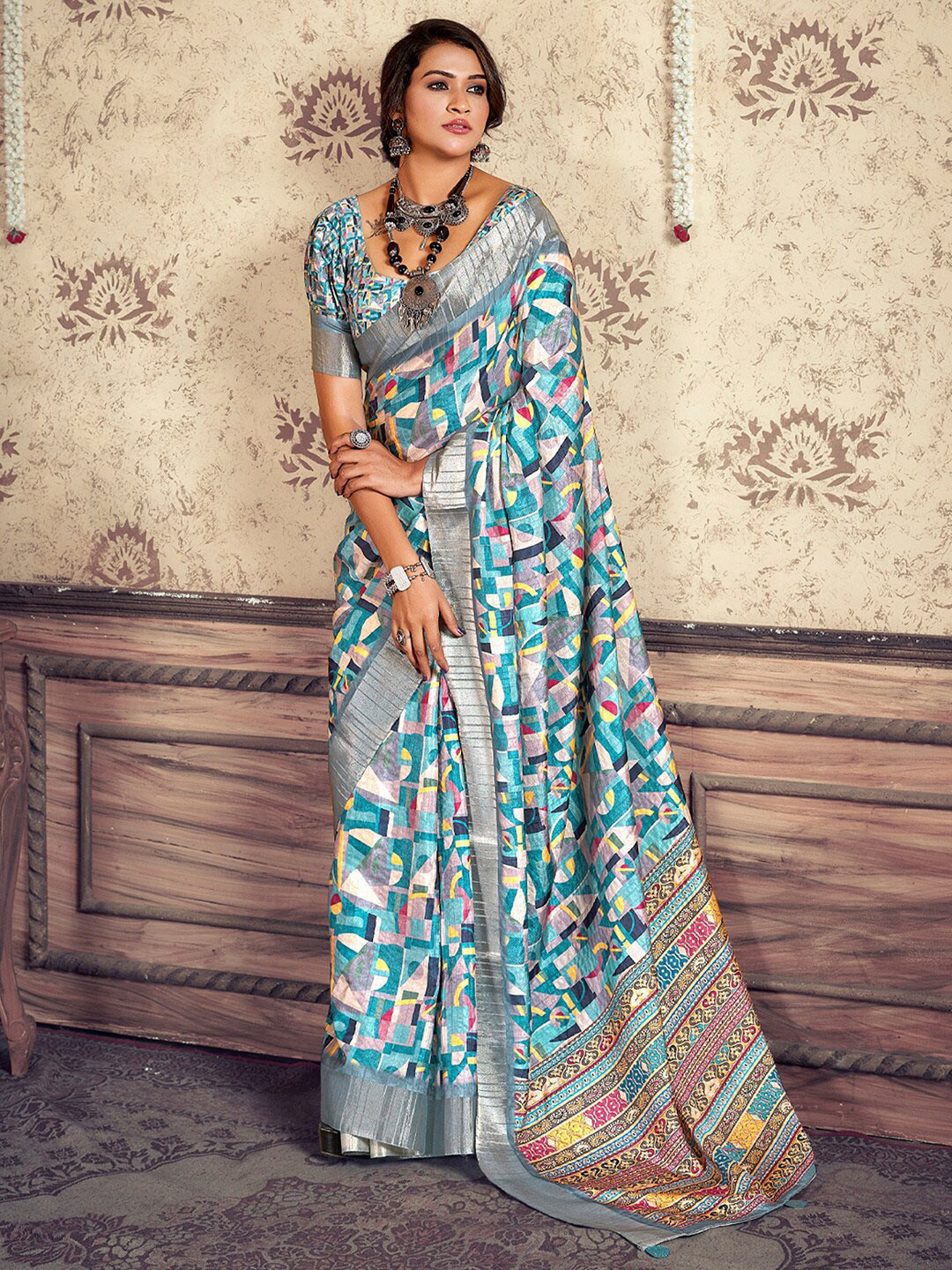 

Mitera Abstract Printed Silk Blend Designer Sungudi Saree, Blue