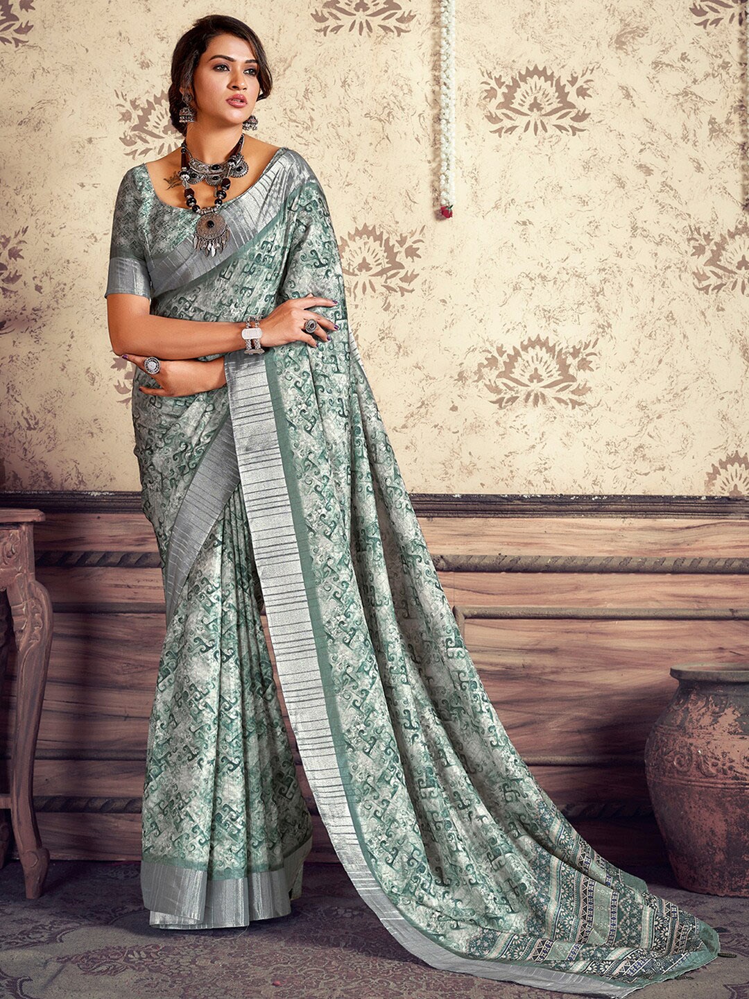

Mitera Sea Green Ethnic Motifs Printed Zari Sungudi Saree