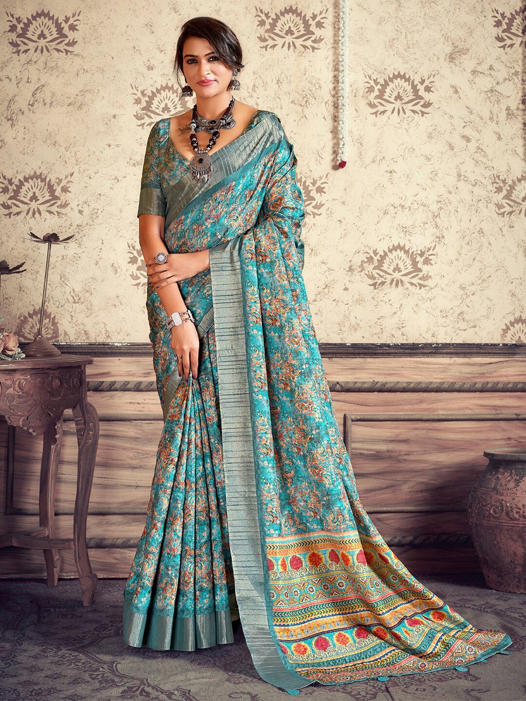 

Mitera Blue Ethnic Motifs Printed Zari Sungudi Saree
