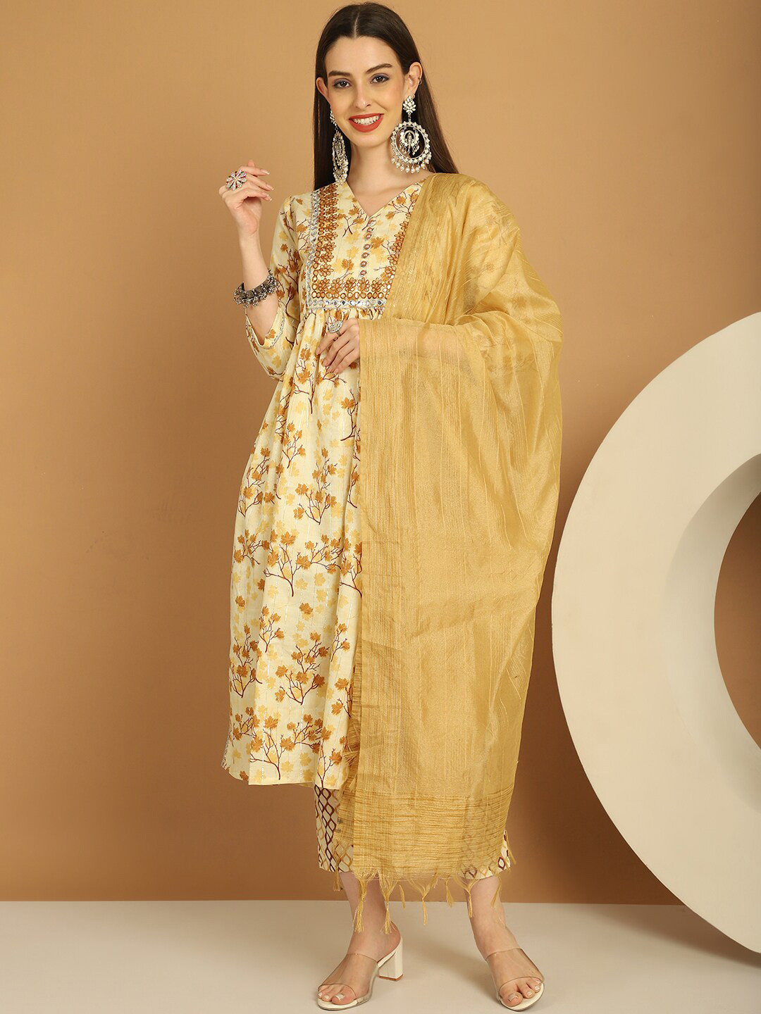 

Tulsattva Floral Printed Mirror Work Kurta With Trousers & Dupatta, Yellow