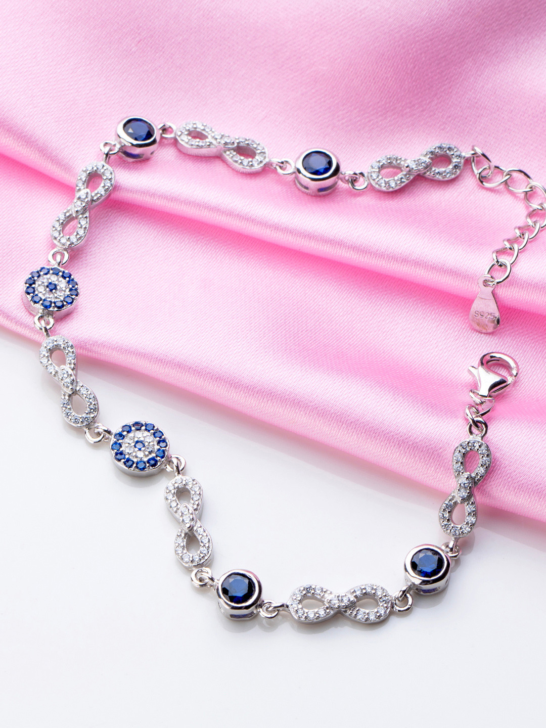 

Zavya Women 925 Sterling Silver CZ-Studded Rhodium-Plated Charm Bracelet