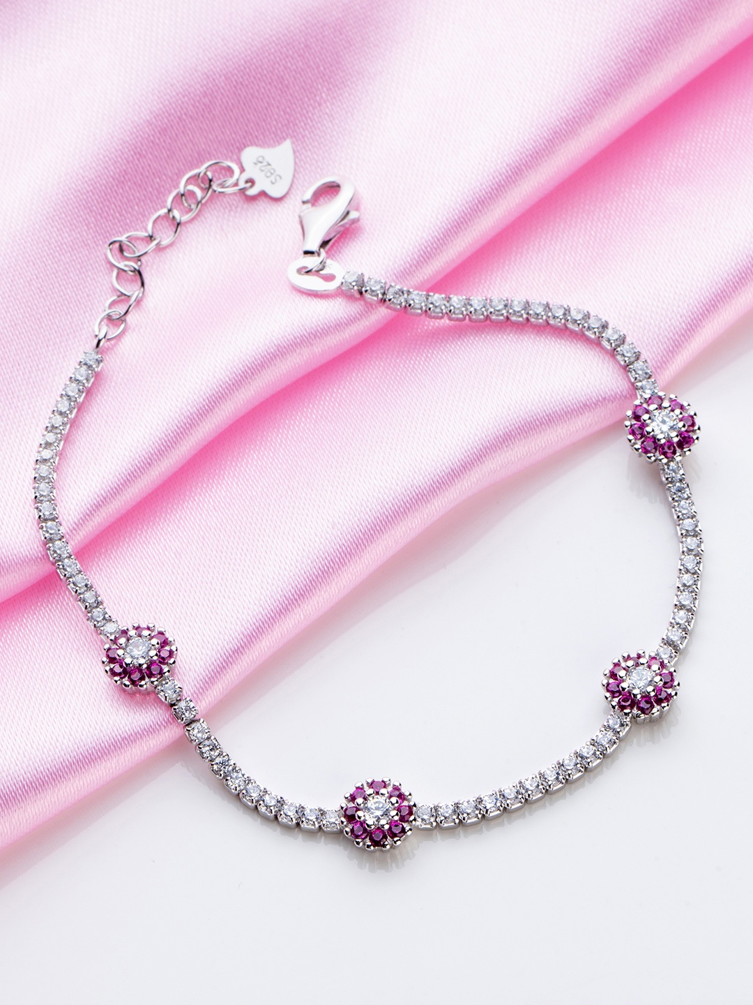 

Zavya Women 925 Sterling Silver CZ-Studded Rhodium-Plated Charm Bracelet