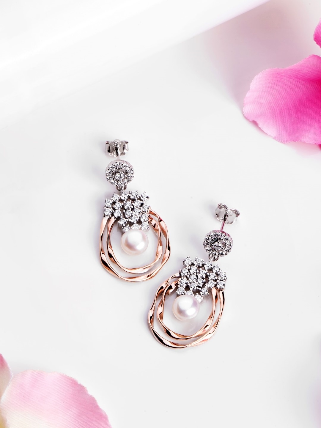 

Zavya Rose Gold Teardrop Shaped Drop Earrings