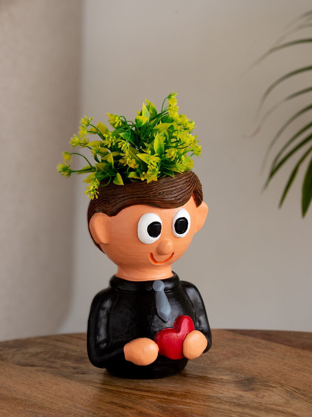 

ExclusiveLane Black Cheerful Lad Terracotta Table Planter Flower Pot