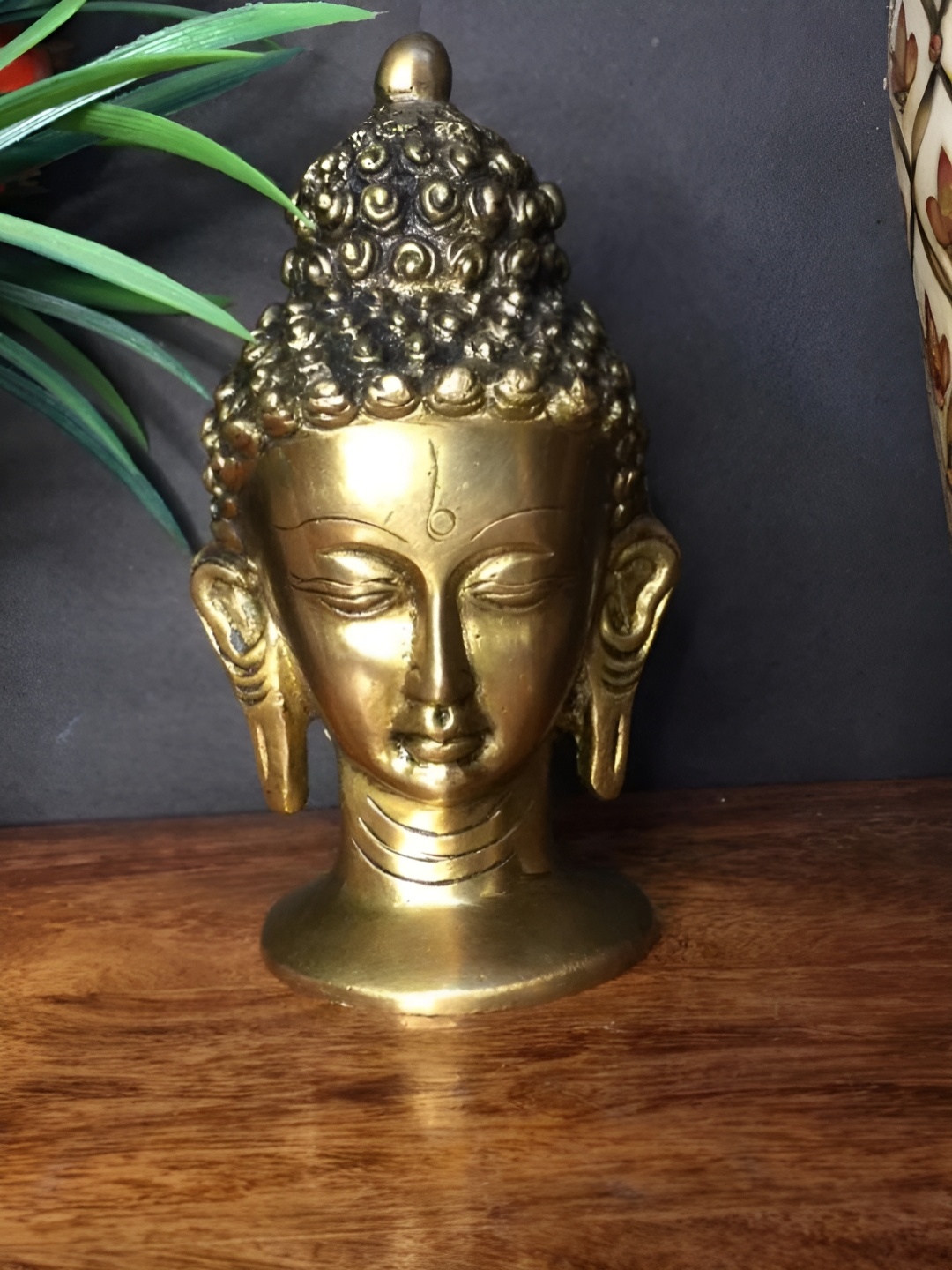 

The Advitya Gold Toned Buddha Brass Idol Showpiece