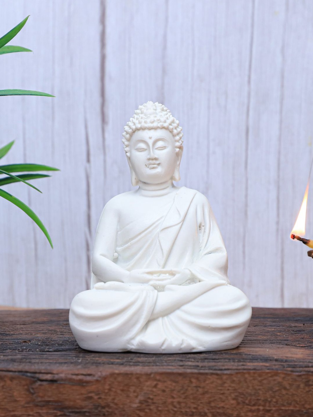 

The Advitya White Meditating Buddha Sitting Showpiece
