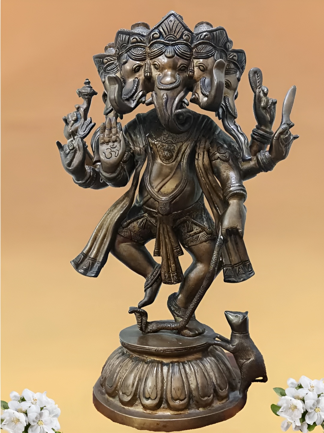 

The Advitya Gold Toned Panchmukhi Dancing Ganesha Brass Showpiece