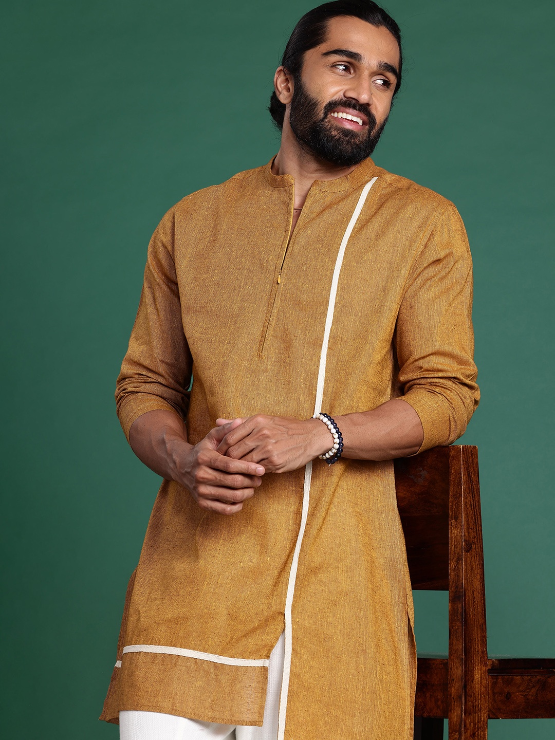 

Sangria Men Solid Kurta, Mustard
