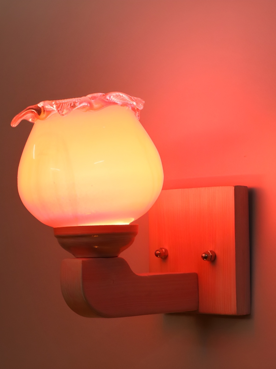 

Afast Pink Glass Contemporary Textured Wall Lamp