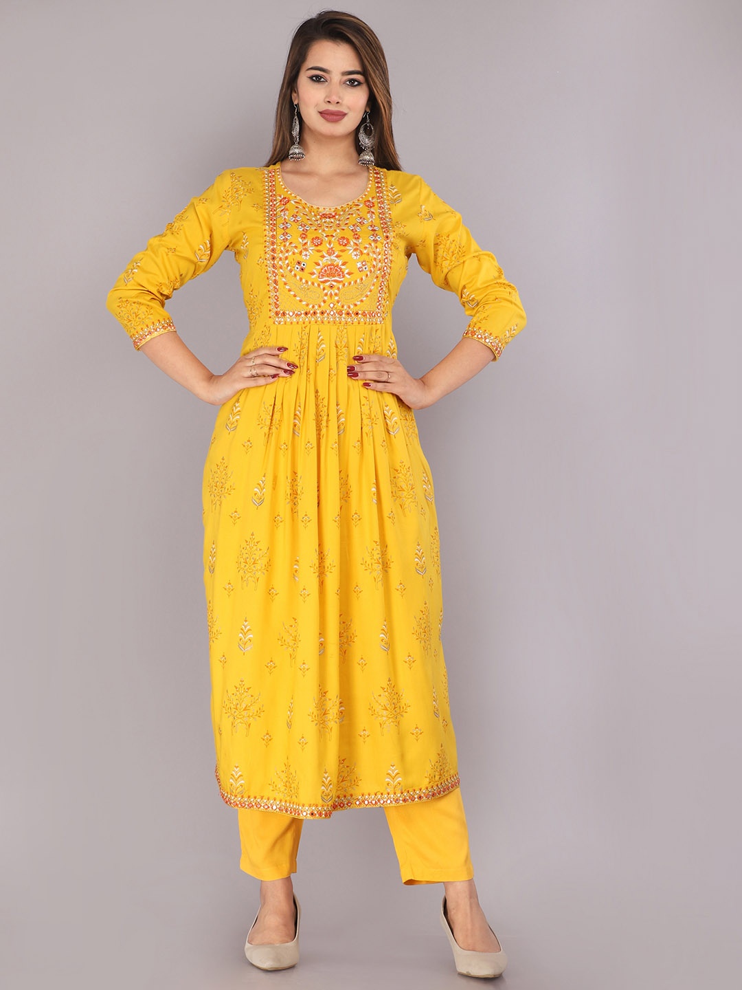 

MARISY Women Yellow Floral Embroidered Empire Thread Work Kurta with Trousers