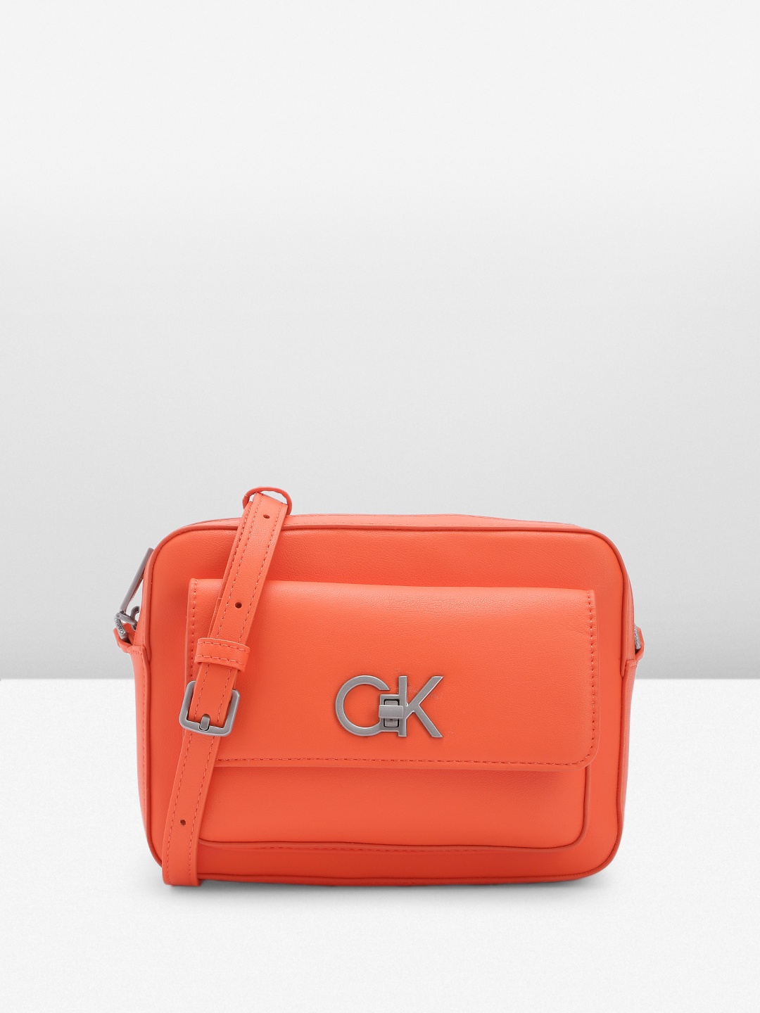 

Calvin Klein Women Solid Sling Bag, Orange