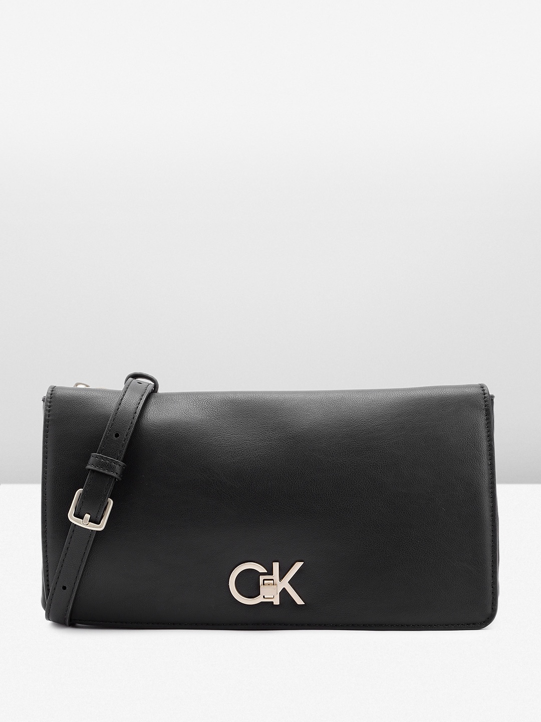 

Calvin Klein Women Solid Sling Bag, Black