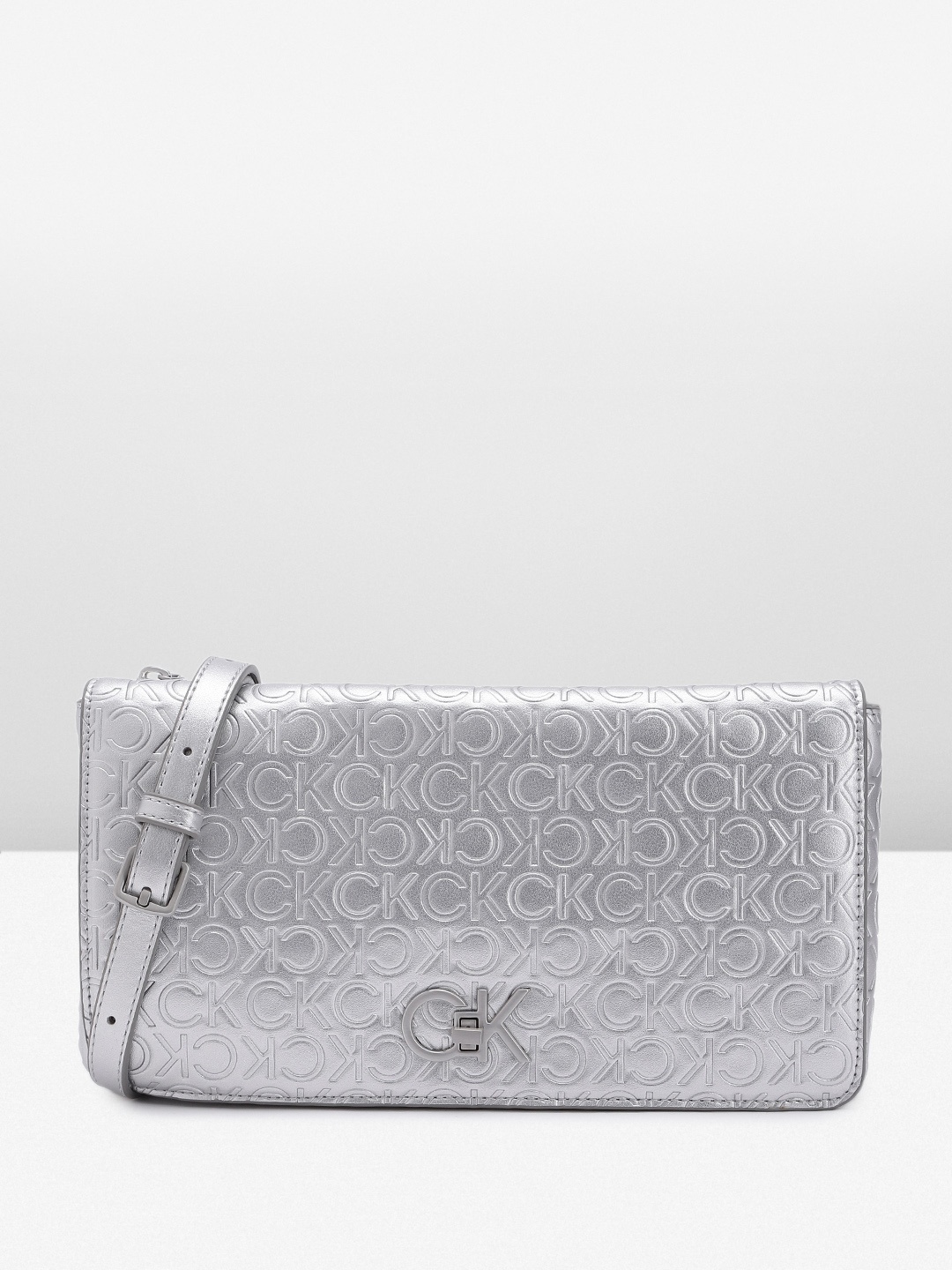 

Calvin Klein Women Textured Sling Bag, Silver