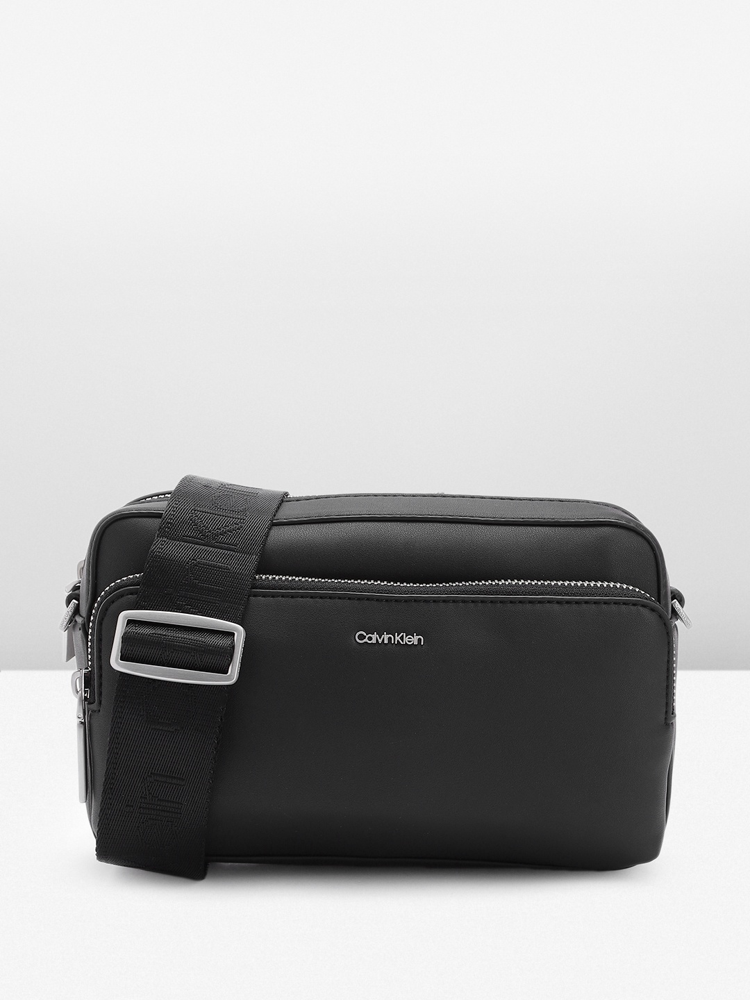 

Calvin Klein Women Solid Sling Bag, Black