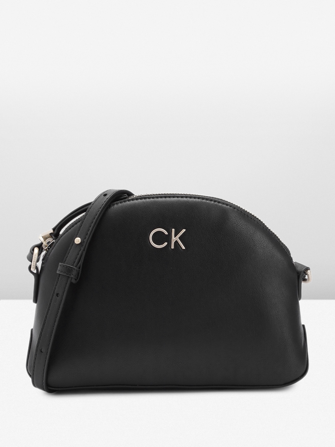 

Calvin Klein Women Solid Sling Bag, Black